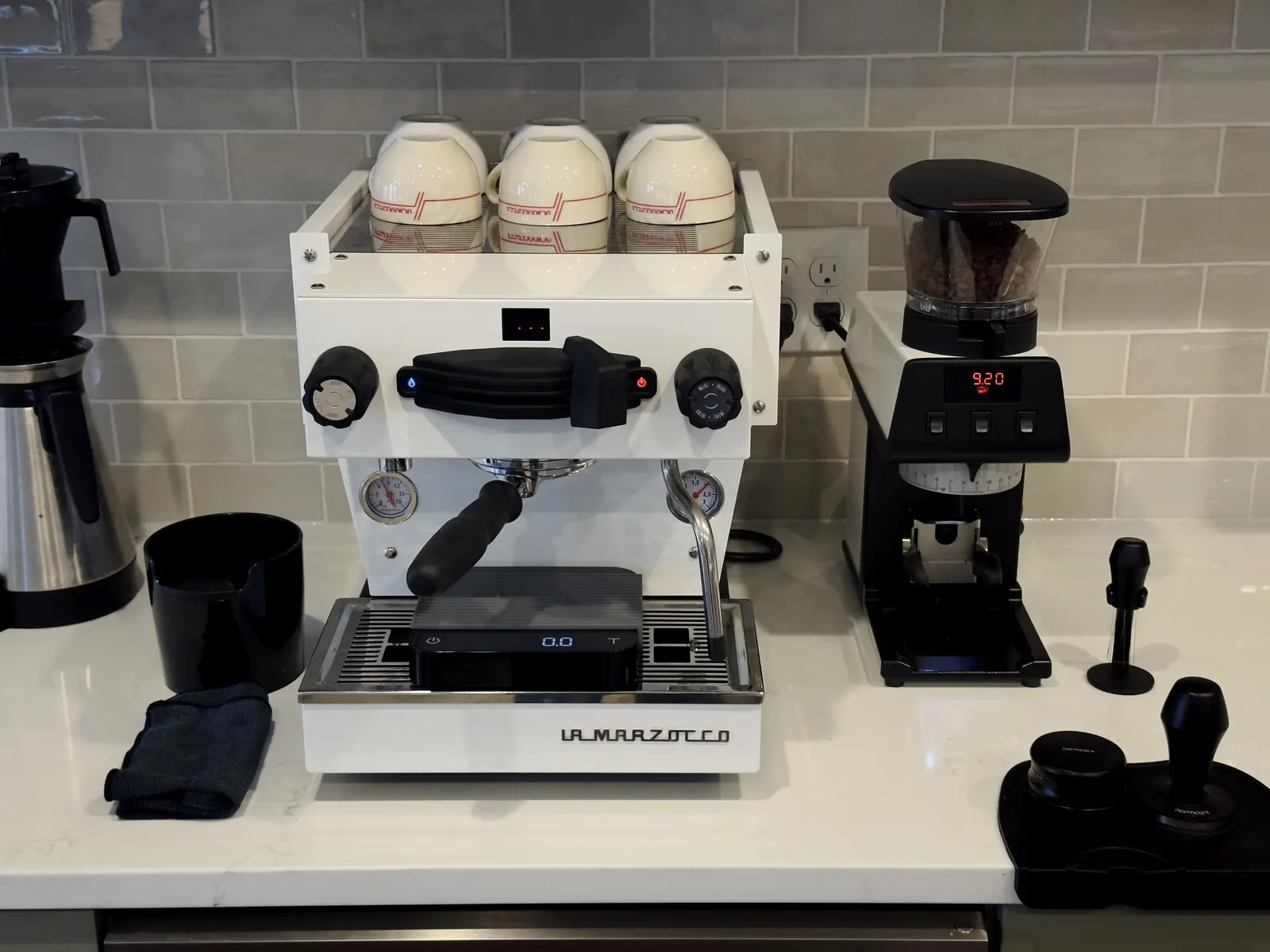 Jason Long's espresso accessories including Normcore tools and Acaia Pearl scale