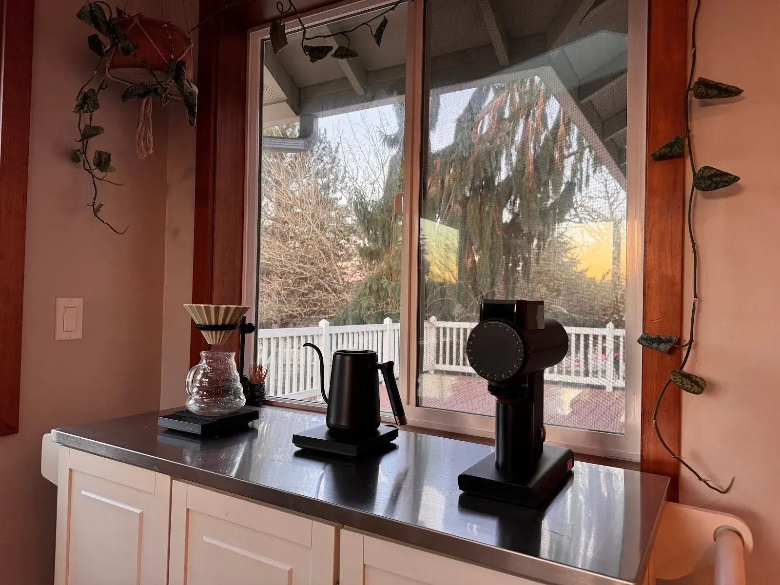 Laila Ghambari's pour over station with Origami dripper, kettle, and coffee grinder